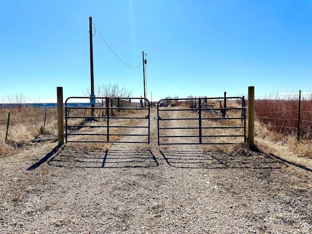 7998 E 5250 S, Randlett, UT 84063 - view of gate with a rural view