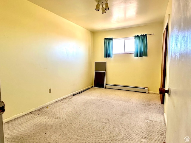 7998 E 5250 S, Randlett, UT 84063 - carpeted spare room with a baseboard radiator and baseboards