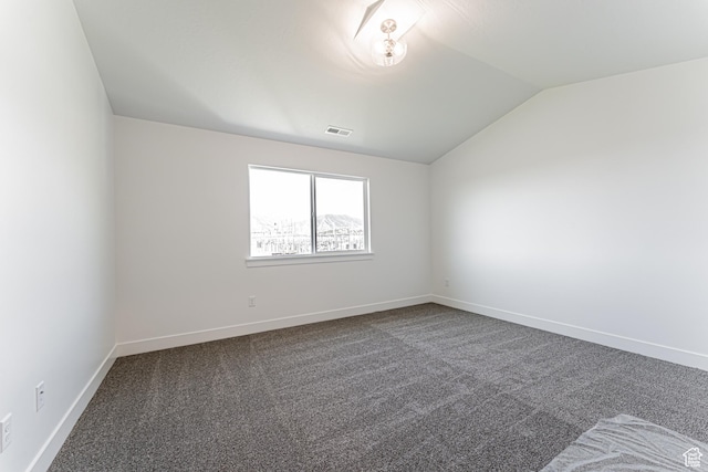 716 W 4500 S Unit 302, Mapleton, UT 84664 - unfurnished room with lofted ceiling, dark carpet, and baseboards