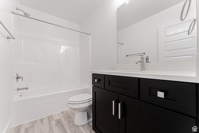 716 W 4500 S Unit 302, Mapleton, UT 84664 - full bath with vanity, toilet, shower / washtub combination, and wood finished floors
