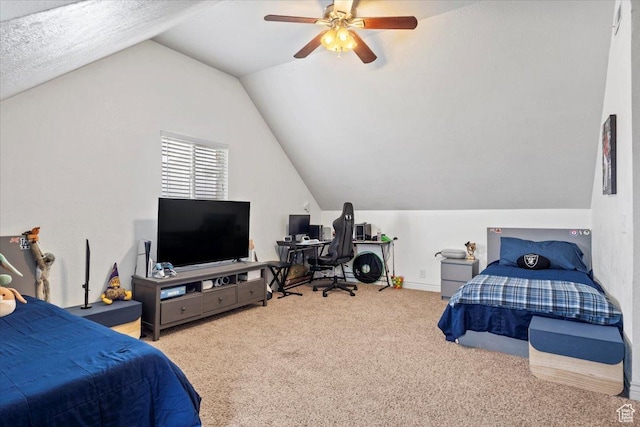 bedroom featuring lofted ceiling, carpet, an office area, and ceiling fan