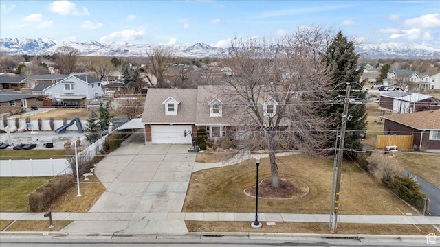 aerial view of residential area with a mountain backdrop