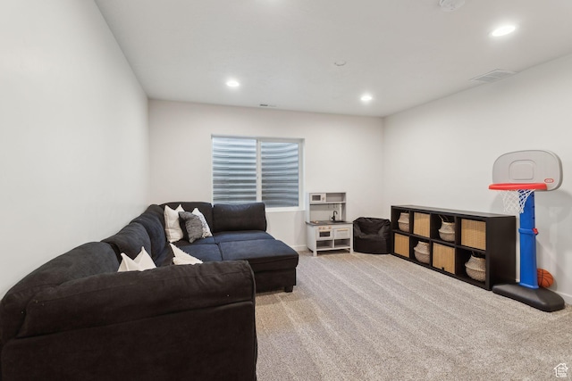 4473 E Hurstbourne Dr, Eagle Mountain, UT 84005 - living room with carpet floors, baseboards, visible vents, and recessed lighting