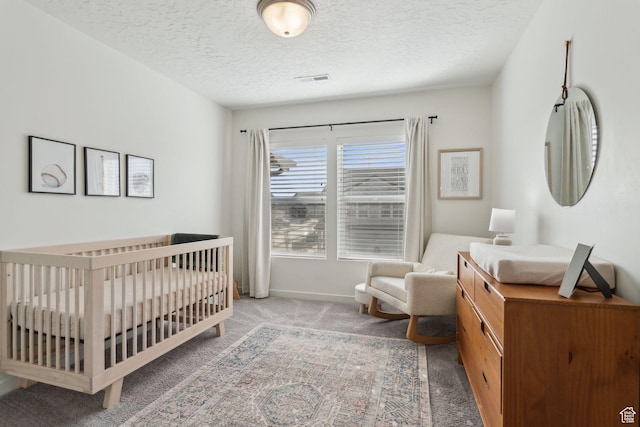 4473 E Hurstbourne Dr, Eagle Mountain, UT 84005 - bedroom with a nursery area, carpet, baseboards, and a textured ceiling