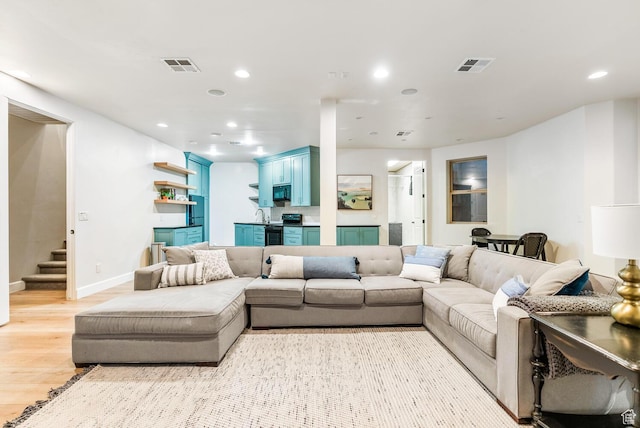 802 Leda Ln, Santa Clara, UT 84765 - living room with stairway, light wood-style flooring, visible vents, and recessed lighting