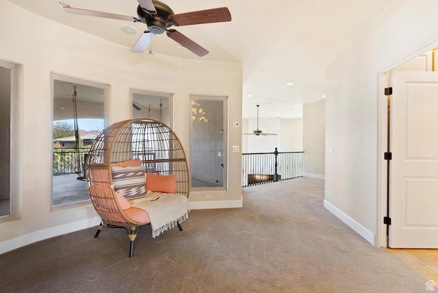 802 Leda Ln, Santa Clara, UT 84765 - living area with a ceiling fan, light carpet, and baseboards
