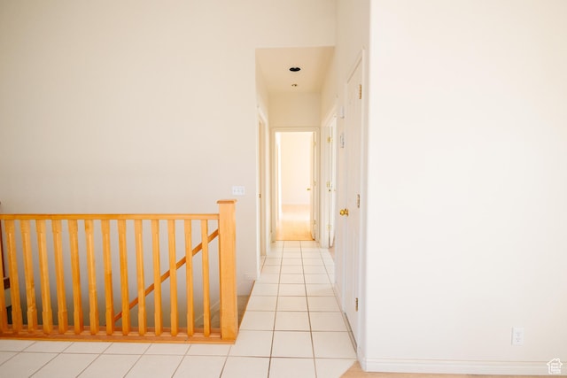 524 S Oak Ln W Unit 3, Tooele, UT 84074 - corridor with light tile patterned floors and an upstairs landing