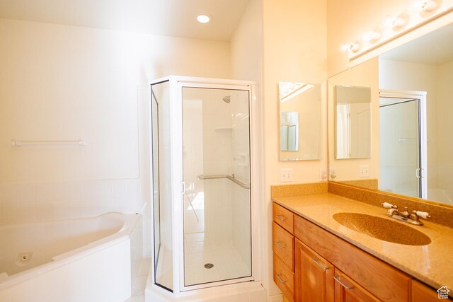 524 S Oak Ln W Unit 3, Tooele, UT 84074 - full bath featuring a stall shower, vanity, and a bath