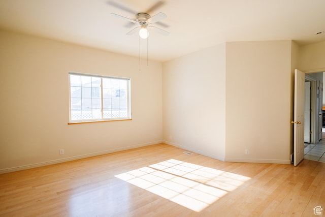 524 S Oak Ln W Unit 3, Tooele, UT 84074 - unfurnished room featuring ceiling fan, light wood-style flooring, and baseboards