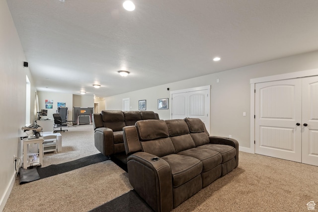 living area with light carpet, baseboards, and recessed lighting