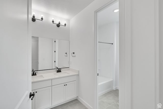 376 W Emma St Unit 623, Grantsville, UT 84029 - full bathroom featuring double vanity, bathtub / shower combination, and baseboards