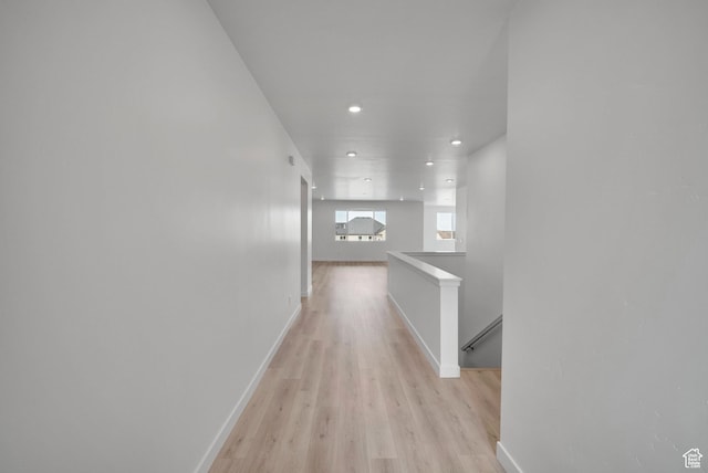 376 W Emma St Unit 623, Grantsville, UT 84029 - corridor with light wood-type flooring, baseboards, recessed lighting, and an upstairs landing