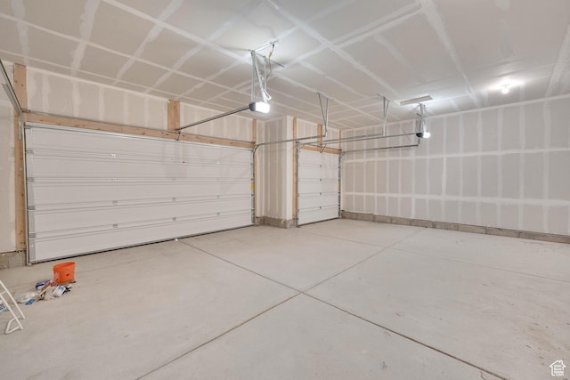 376 W Emma St Unit 623, Grantsville, UT 84029 - garage with a garage door opener and baseboards