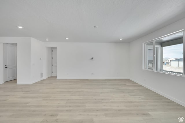 376 W Emma St Unit 623, Grantsville, UT 84029 - spare room with recessed lighting, baseboards, and light wood-type flooring