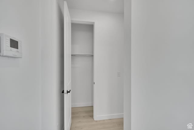 376 W Emma St Unit 623, Grantsville, UT 84029 - hallway with light wood-style floors and baseboards