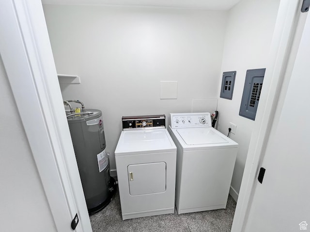 clothes washing area with electric panel, water heater, independent washer and dryer, and laundry area