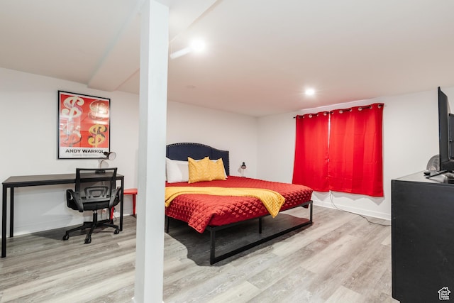750 N 100 W, Logan, UT 84321 - bedroom featuring wood finished floors and baseboards