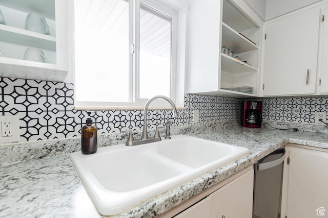 750 N 100 W, Logan, UT 84321 - kitchen with a sink, white cabinetry, plenty of natural light, and decorative backsplash