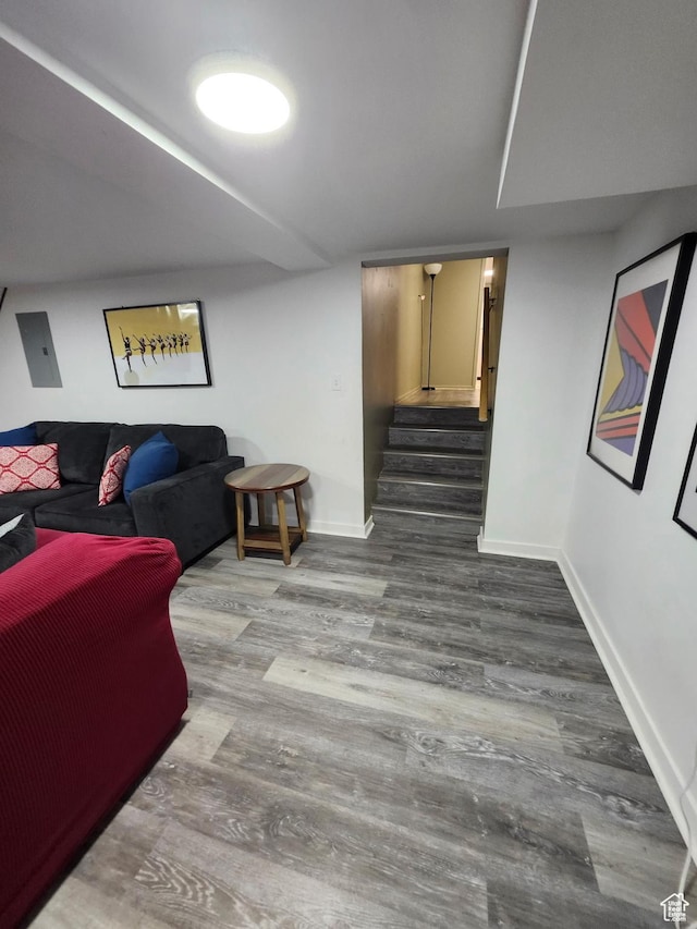 750 N 100 W, Logan, UT 84321 - living area with stairway, wood finished floors, and baseboards