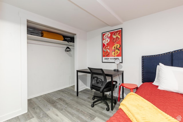 750 N 100 W, Logan, UT 84321 - bedroom featuring wood finished floors and baseboards