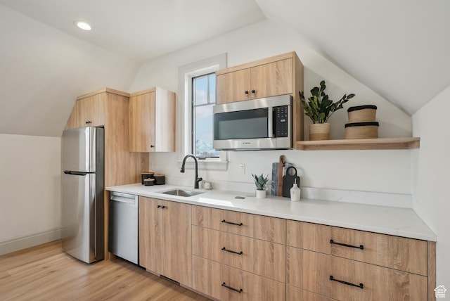 202 W Saddle View Ln, Midway, UT 84049 - kitchen with appliances with stainless steel finishes, open shelves, vaulted ceiling, light brown cabinets, and light wood finished floors