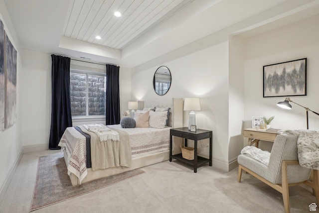 bedroom featuring recessed lighting, light colored carpet, wood ceiling, baseboards, and a raised ceiling