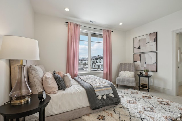 bedroom featuring recessed lighting, carpet, visible vents, and baseboards