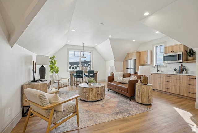202 W Saddle View Ln, Midway, UT 84049 - living area featuring healthy amount of natural light, light wood-style flooring, vaulted ceiling, and recessed lighting