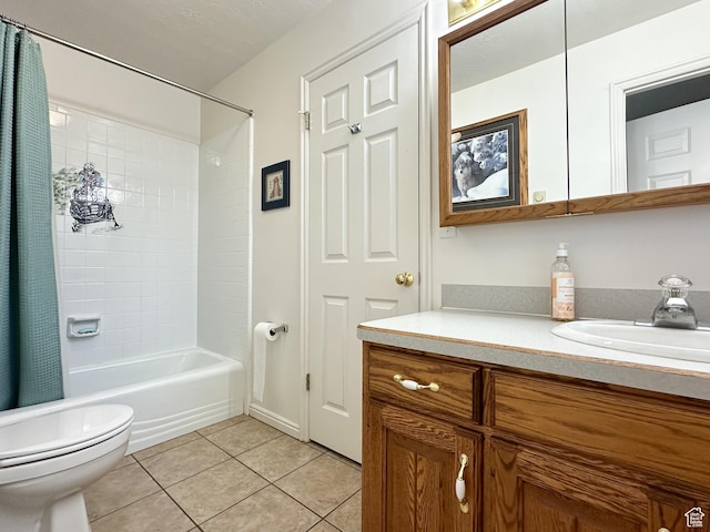 full bath featuring shower / bath combination with curtain, tile patterned flooring, vanity, and toilet