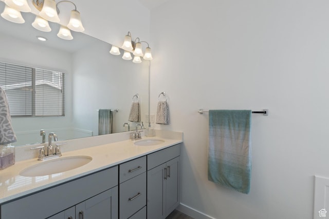 1033 E Bigelow Ave, Layton, UT 84040 - bathroom featuring double vanity and a sink