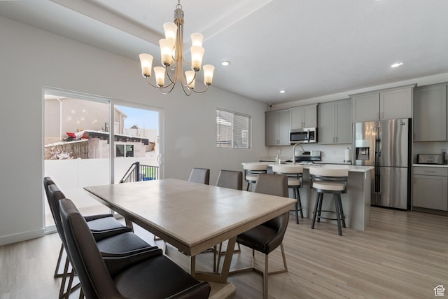 1033 E Bigelow Ave, Layton, UT 84040 - dining space with recessed lighting, a notable chandelier, and light wood finished floors