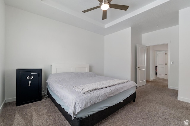 1033 E Bigelow Ave, Layton, UT 84040 - bedroom with a ceiling fan, a raised ceiling, carpet, and baseboards