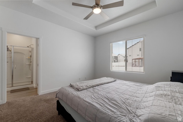 1033 E Bigelow Ave, Layton, UT 84040 - carpeted bedroom with baseboards, ceiling fan, connected bathroom, and a tray ceiling