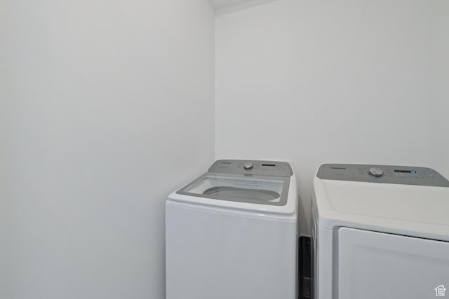 1033 E Bigelow Ave, Layton, UT 84040 - clothes washing area featuring washing machine and clothes dryer and laundry area