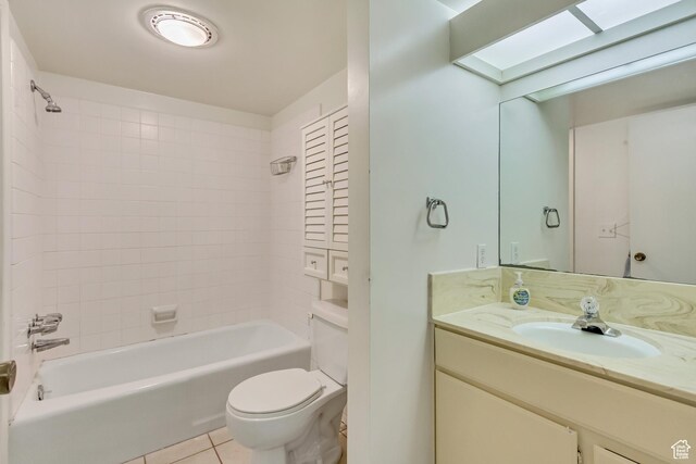 4953 S Eastridge Ln E Unit 143, Salt Lake City, UT 84117 - full bathroom with a skylight, toilet, tile patterned flooring, vanity, and shower / washtub combination