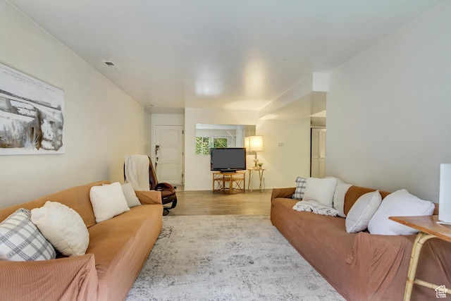 4953 S Eastridge Ln E Unit 143, Salt Lake City, UT 84117 - living area featuring light wood-type flooring and visible vents