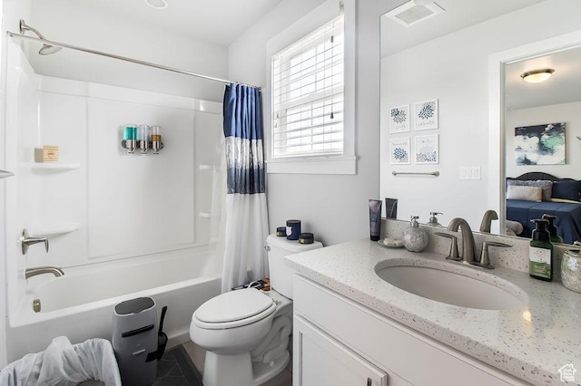 ensuite bathroom with vanity, toilet, visible vents, shower / bath combo with shower curtain, and ensuite bathroom