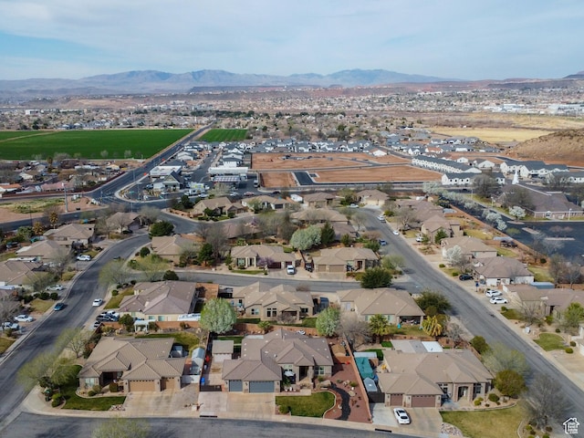 1908 S Yuma Dr, Washington, UT 84780 - aerial overview of property's location featuring nearby suburban area and a mountain backdrop