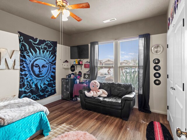 1908 S Yuma Dr, Washington, UT 84780 - bedroom with a closet, wood finished floors, and a ceiling fan