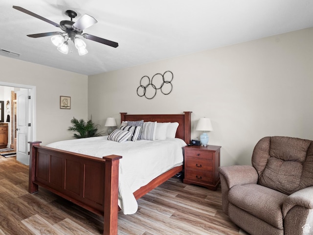 1908 S Yuma Dr, Washington, UT 84780 - bedroom featuring light wood-style flooring and a ceiling fan