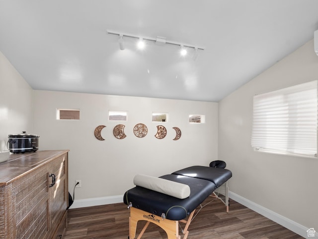 1908 S Yuma Dr, Washington, UT 84780 - home office with track lighting, lofted ceiling, and wood finished floors