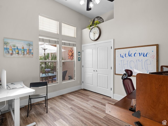 1908 S Yuma Dr, Washington, UT 84780 - office space with a towering ceiling, wood finished floors, and a ceiling fan