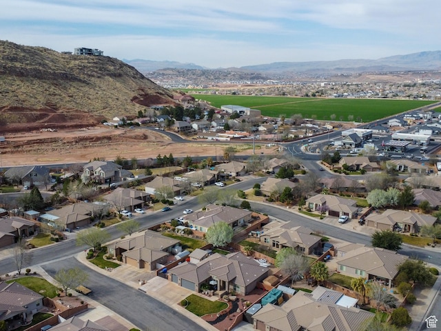1908 S Yuma Dr, Washington, UT 84780 - aerial view of property's location with a mountain backdrop and nearby suburban area