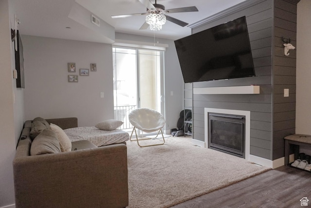 1055 S 500 E Unit D204, Heber City, UT 84032 - living area with visible vents, a glass covered fireplace, ceiling fan, wood finished floors, and baseboards