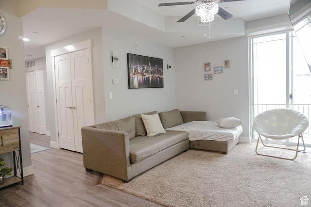 1055 S 500 E Unit D204, Heber City, UT 84032 - living area featuring ceiling fan, light wood finished floors, visible vents, and baseboards
