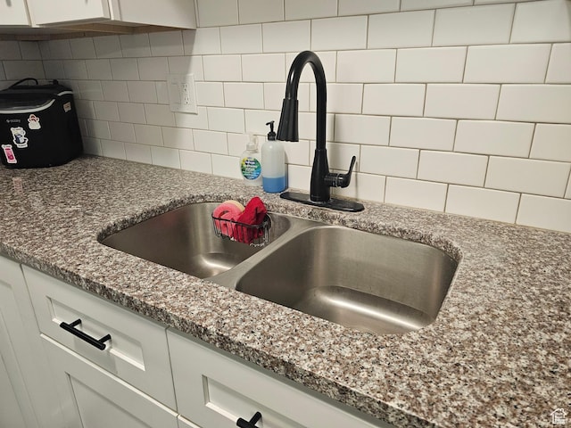 1055 S 500 E Unit D204, Heber City, UT 84032 - interior details with a sink, white cabinetry, and decorative backsplash