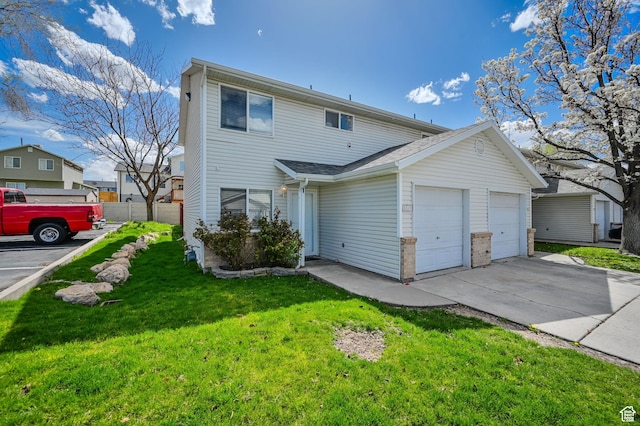 view of front of property with a garage, concrete driveway, a front yard, and fence