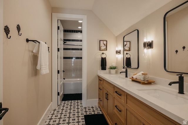 1685 W Midway Ln, Heber City, UT 84032 - bathroom featuring double vanity, vaulted ceiling, baseboards, and a sink