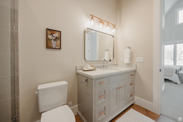 1685 W Midway Ln, Heber City, UT 84032 - ensuite bathroom with connected bathroom, vanity, toilet, and a wealth of natural light