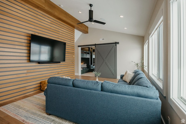 1685 W Midway Ln, Heber City, UT 84032 - living room featuring a ceiling fan, a barn door, baseboards, wood finished floors, and lofted ceiling with beams